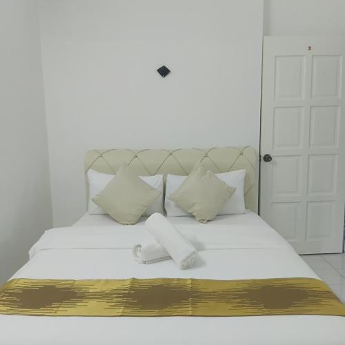 Una cama o camas en una habitación de Olive home