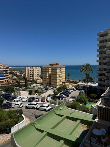Benalbeach Beauty- Sunny studio with ocean views, balcony, and windows in every room
