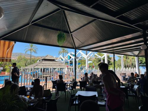 Benalbeach Beauty- Sunny studio with ocean views, balcony, and windows in every room
