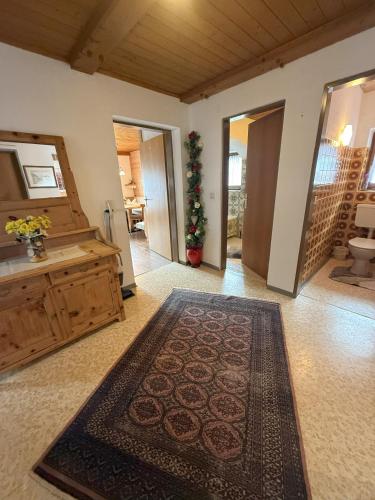 a living room with a rug on the floor at Ferienhaus Innergruben in Laimach