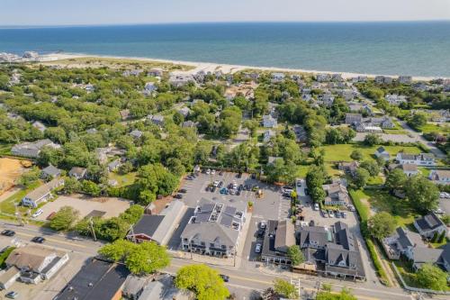 an aerial view of a park next to the ocean at 557 Route 28, Unit 203, Harwich Port Cape Cod - - Perfect Rx in Harwich Port