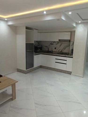 Kuchyň nebo kuchyňský kout v ubytování appartment igar azougagh elhoceima