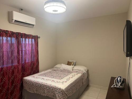 Cama o camas de una habitación en Residencial Quinta Los Laureles
