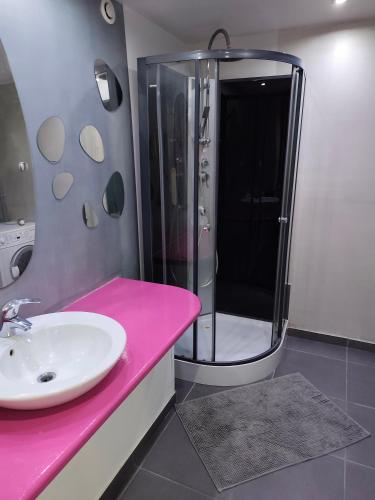 a bathroom with a sink and a shower at BOUTIQUE HOSTEL BY Cassis in Cassis