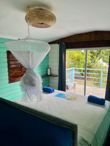 Postel nebo postele na pokoji v ubytování Dolphin Blue Paradise