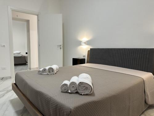Ένα ή περισσότερα κρεβάτια σε δωμάτιο στο BreMi Rooms B&B