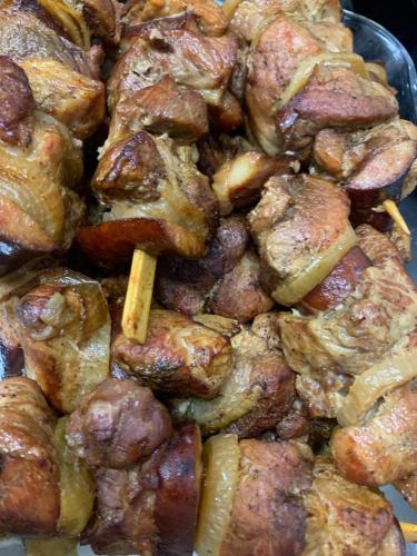 a pile of food with chop sticks in it at Penzion Vila Křenov in Bernartice