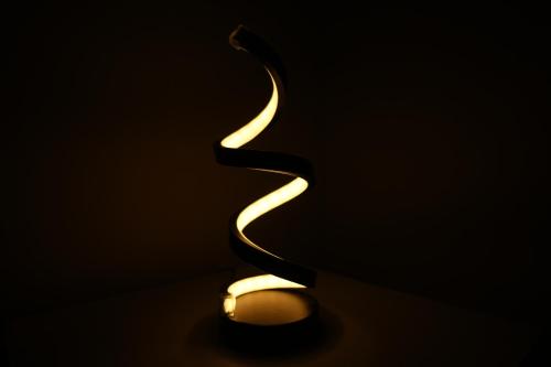 a close up of a lit candle in the dark at Perfect Place for Family in Lahore in Lahore
