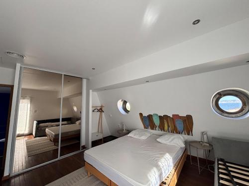 Postel nebo postele na pokoji v ubytování Cornich' Kennedy