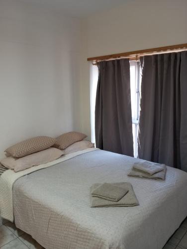 Ένα ή περισσότερα κρεβάτια σε δωμάτιο στο Departamento Premium Colon y Güemes