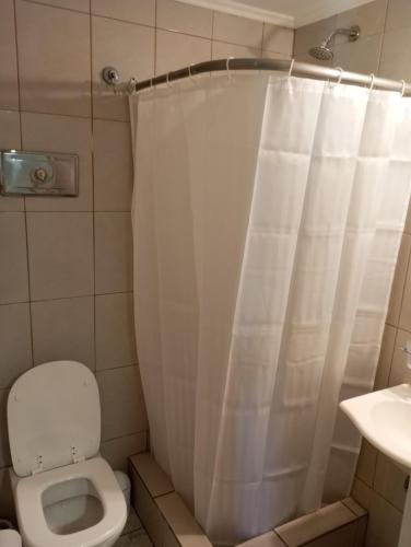 Ένα μπάνιο στο Departamento Premium Colon y Güemes