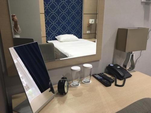 Кровать или кровати в номере Orynbor Boutique Hotel