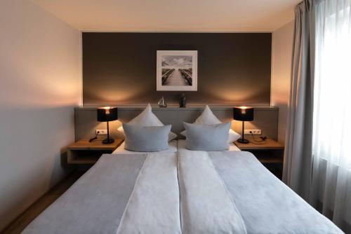 Hotel Friesenhofにあるベッド