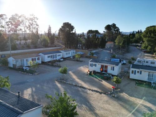an aerial view of a village with white houses at Camping Albox in Albox