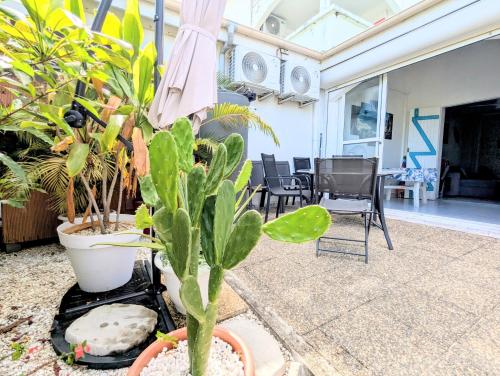 Αίθριο ή υπαίθριος χώρος στο Rêve Grenadine plage 200m jardin & terrasse