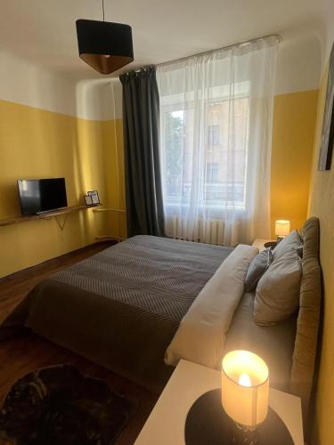 Katil atau katil-katil dalam bilik di Riga, City center apartment