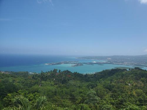 a view of a lake from a mountain at BAYVIEW LUXURY RETREATS st Jame in Montego Bay