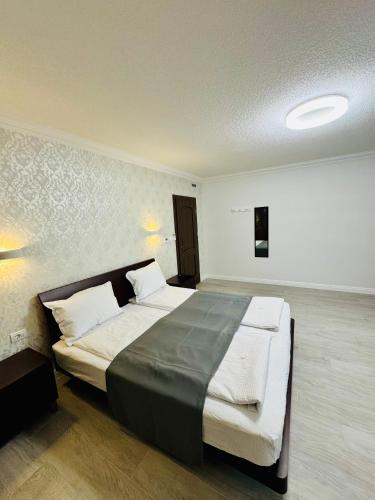 Katil atau katil-katil dalam bilik di Roua Residence