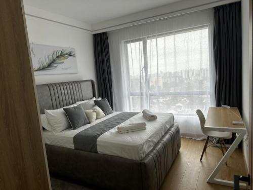 Ένα ή περισσότερα κρεβάτια σε δωμάτιο στο Telihaus Panoramic View Loft