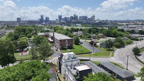 an aerial view of a city with a building at New Elevations Rooftop 5 Min to Downtown Nash in Nashville