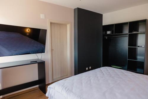 Cama o camas de una habitación en Hotel Impex