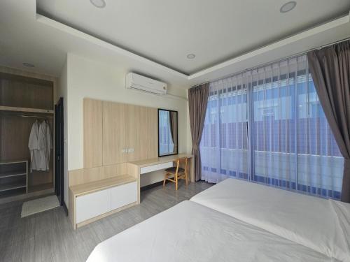 Katil atau katil-katil dalam bilik di Ayutthaya Pool Villa