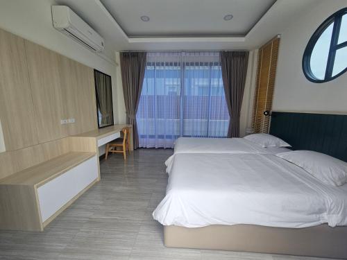Katil atau katil-katil dalam bilik di Ayutthaya Pool Villa