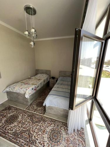 Llit o llits en una habitació de PalmBeach
