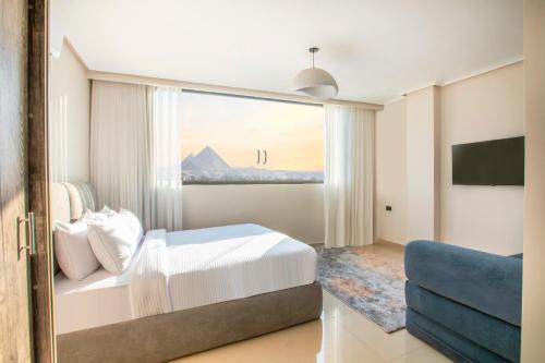 Ένα ή περισσότερα κρεβάτια σε δωμάτιο στο Luxurious Hotel Apartment and Suites