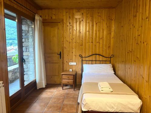 Ένα ή περισσότερα κρεβάτια σε δωμάτιο στο Casa Franch - L'Amfitriona