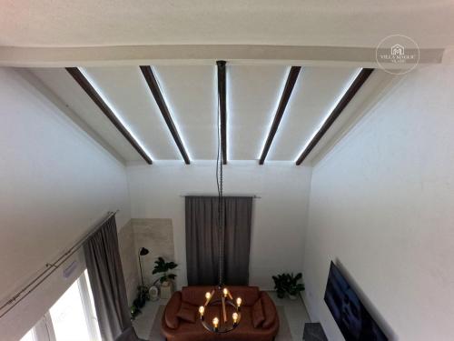 a skylight in a living room with a ceiling at Villa Maglić Vlašić in Vlasic