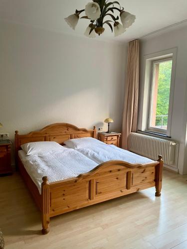 Ein Bett oder Betten in einem Zimmer der Unterkunft Hotel Villa Tosca