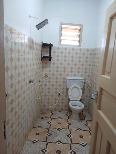 Koupelna v ubytování Fatnaish Apartment Mzungu
