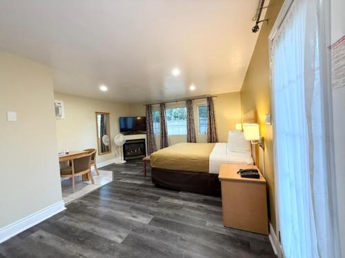Ένα ή περισσότερα κρεβάτια σε δωμάτιο στο North Bay Inn