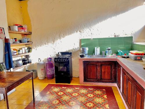 Una cocina o cocineta en Casa Real - Encanto Colonial