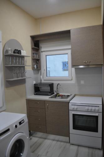 Η κουζίνα ή μικρή κουζίνα στο Sea Breeze House
