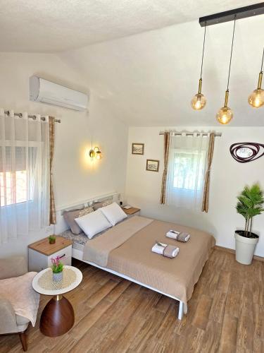 Ένα ή περισσότερα κρεβάτια σε δωμάτιο στο Sunny Side Apartments