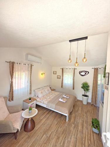 Ένα ή περισσότερα κρεβάτια σε δωμάτιο στο Sunny Side Apartments