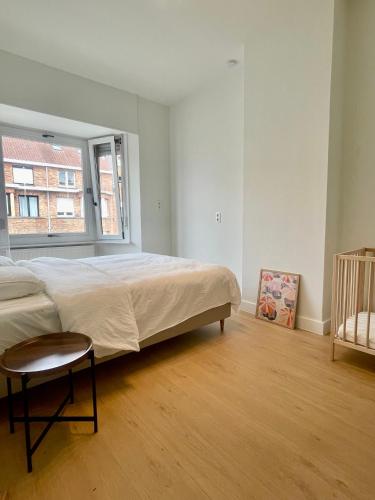Ένα ή περισσότερα κρεβάτια σε δωμάτιο στο Vakantiehuis Ilo De Panne