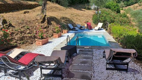 San Quirico di MorianoにあるBorghetto Gaddini - Gli Americani Deluxe Apartment- Panoramic view and poolのギャラリーの写真