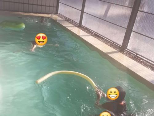 a group of balls in a swimming pool at Utopía in Balneario Argentino
