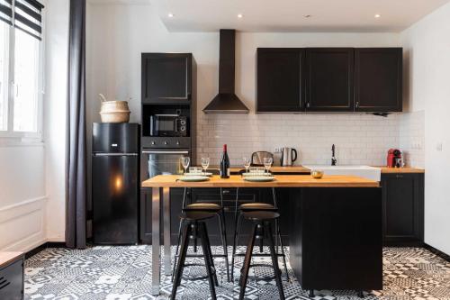 Kuchyň nebo kuchyňský kout v ubytování DIFY Dauphiné - Part Dieu