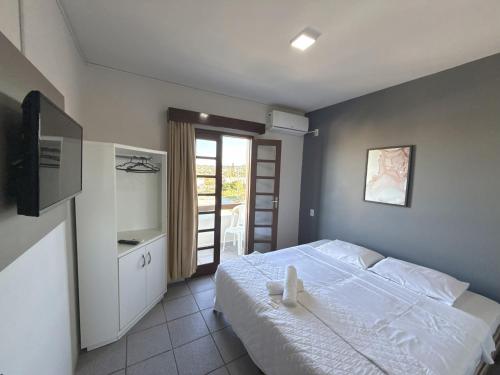 Postel nebo postele na pokoji v ubytování Hotel & Pousada Bella Vista