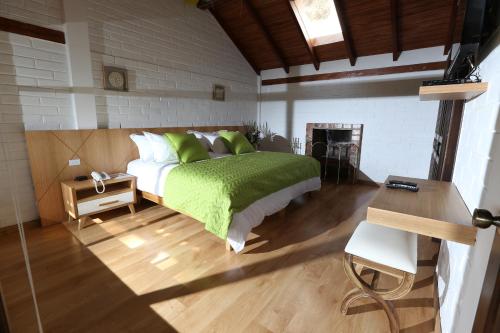Postel nebo postele na pokoji v ubytování Hosteria Totoral