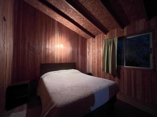 Postel nebo postele na pokoji v ubytování Mirador del Rukapillan en Likan Ray