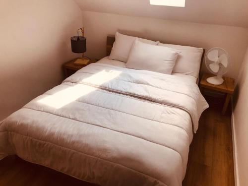 Postel nebo postele na pokoji v ubytování L appart 5 Açaï