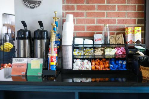 a counter with food and other items on it at Illini Inn & Suites in Rantoul