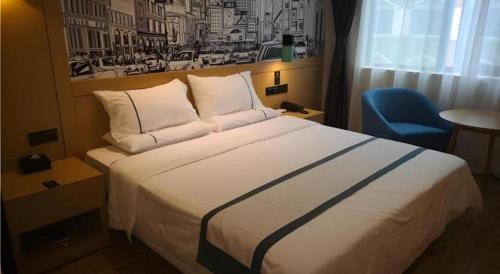 Ένα ή περισσότερα κρεβάτια σε δωμάτιο στο City Comfort Inn Mianyang Southwest University Of Science And Technology