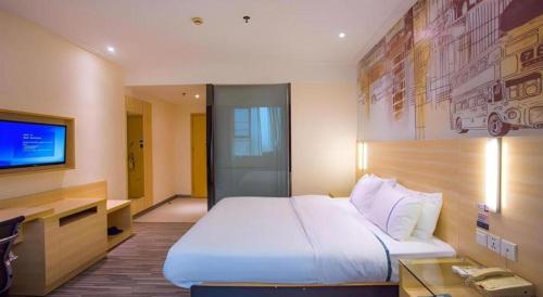 Letto o letti in una camera di City Comfort Inn Hotel Guilin Hongling Road