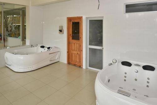Phòng tắm tại Gran Hotel De Lago - El Coca
